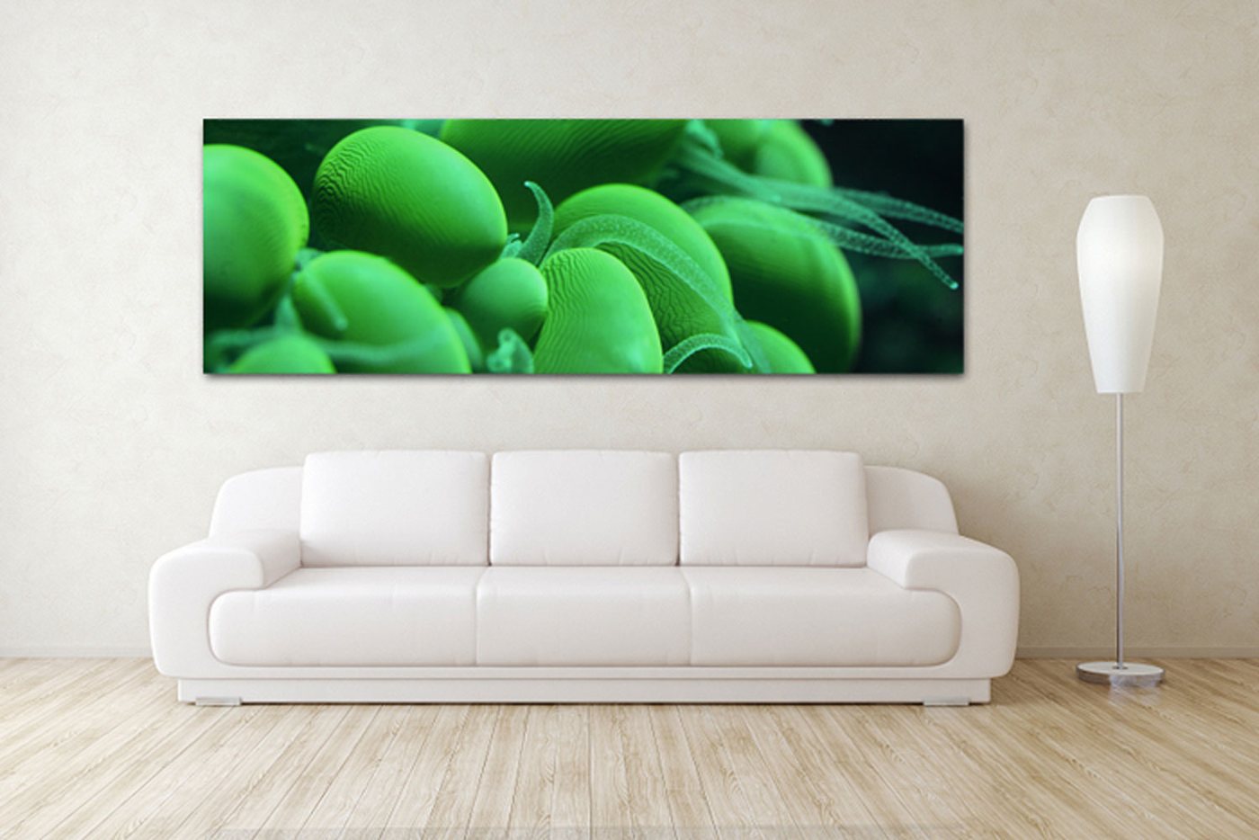 Green Tentacles reef print displayed above a white sofa